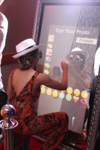 Wedding Entertainment Package 2 Guests enjoying the Photo Booth from our Wedding Entertainment Package